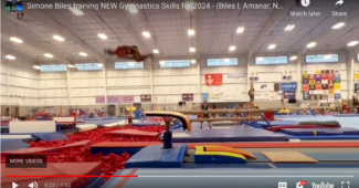 A screenshot of a YouTube video that shows Simone Biles practicing a Yurchenko double tuck.